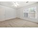 Bedroom with neutral colors, carpet floors, ceiling fan, and natural light at 503 Madison Se Ct, Smyrna, GA 30080