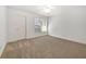 Bedroom with neutral colors, carpet floors, ceiling fan, and natural light at 503 Madison Se Ct, Smyrna, GA 30080