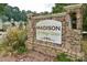 Stone entrance sign for the Madison @ Village Green community at 503 Madison Se Ct, Smyrna, GA 30080