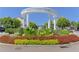 Beautiful Smyrna Market Village entrance with colorful flowers and greenery at 503 Madison Se Ct, Smyrna, GA 30080