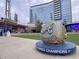 Outdoor statue celebrating the World Series Champions with restaurants and a high-rise building in the background at 503 Madison Se Ct, Smyrna, GA 30080