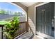 Condominium's inviting front door with sidelight and slate tile porch at 503 Madison Se Ct, Smyrna, GA 30080