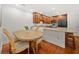 Charming kitchen with granite countertops, stainless appliances and eat-in breakfast bar at 503 Madison Se Ct, Smyrna, GA 30080