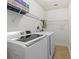 Laundry room featuring new appliances and tile floors at 503 Madison Se Ct, Smyrna, GA 30080