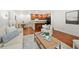 Bright living space featuring hardwood floors, plush seating and an open layout at 503 Madison Se Ct, Smyrna, GA 30080