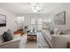 Open concept living area leading to a private balcony through elegant glass doors at 503 Madison Se Ct, Smyrna, GA 30080