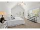 The spacious main bedroom features vaulted ceilings and lots of natural light at 503 Madison Se Ct, Smyrna, GA 30080