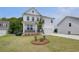 Charming two-story home with a well manicured front yard and a welcoming front porch at 540 Teversham Dr, Mcdonough, GA 30253