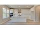 Modern kitchen boasting white cabinets, stainless steel appliances, and a center island at 540 Teversham Dr, Mcdonough, GA 30253