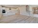 Modern kitchen with white cabinets, stainless steel appliances, and a large center island at 540 Teversham Dr, Mcdonough, GA 30253