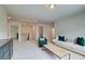 Spacious living room with plush carpeting, neutral walls, and a cozy seating area with modern furniture at 540 Teversham Dr, Mcdonough, GA 30253