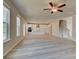 Spacious open-concept living area flowing into a kitchen, complete with hardwood floors at 540 Teversham Dr, Mcdonough, GA 30253