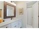 Bright bathroom with a modern vanity, updated lighting, and a shower and tub combination at 960 Tiverton Ln, Alpharetta, GA 30022