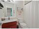 Bathroom with a modern vanity, neutral wall color, and combination shower and tub at 960 Tiverton Ln, Alpharetta, GA 30022