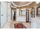 Bright bathroom featuring walk-in shower, double vanity, and doorways to walk-in closet at 960 Tiverton Ln, Alpharetta, GA 30022