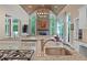 Gourmet kitchen with granite countertops, stainless appliances, island cooktop, and views of the living area with fireplace at 960 Tiverton Ln, Alpharetta, GA 30022