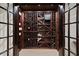 A beautiful wine cellar with a custom wood racking system to hold many bottles of wine at 960 Tiverton Ln, Alpharetta, GA 30022