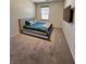 Bedroom with neutral walls, a bed with a teal coverlet, and a window at 2089 Belmont Cir, Conyers, GA 30012