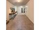 Upstairs hallway with natural light and a console table with decorative art at 2089 Belmont Cir, Conyers, GA 30012