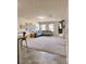 Open-concept living room with a comfortable seating area, natural light and TV at 2089 Belmont Cir, Conyers, GA 30012