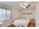 Bright bedroom featuring a ceiling fan, hardwood floors, neutral paint and a sun-filled window at 210 Sampson Ne St # 8, Atlanta, GA 30312