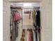 Organized closet with shelving, hanging rods, and plenty of space for clothes and storage at 210 Sampson Ne St # 8, Atlanta, GA 30312