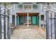 Charming entry with comfortable seating and decorative flower boxes at 210 Sampson Ne St # 8, Atlanta, GA 30312