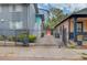 Exterior view of charming apartment building with fenced yard and beautiful landscaping at 210 Sampson Ne St # 8, Atlanta, GA 30312