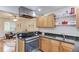 Stylish kitchen overlooking living area, equipped with granite counters and stainless steel appliances at 210 Sampson Ne St # 8, Atlanta, GA 30312