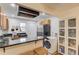 Modern kitchen with stainless steel appliances, granite countertops, and a convenient in-unit washer at 210 Sampson Ne St # 8, Atlanta, GA 30312