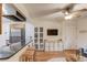 Open-concept living space with a breakfast bar, hardwood floors, and direct access to the kitchen at 210 Sampson Ne St # 8, Atlanta, GA 30312