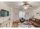 Cozy living room featuring stylish decor, comfortable seating, and a ceiling fan at 210 Sampson Ne St # 8, Atlanta, GA 30312