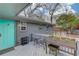 Charming patio with seating, a small garden, a bright door, and brick exterior at 210 Sampson Ne St # 8, Atlanta, GA 30312