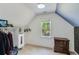 Walk-in closet with custom shelving and window at 3918 Windgrove Xing, Suwanee, GA 30024