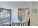 Light-filled hallway with pendant light and architectural details at 3918 Windgrove Xing, Suwanee, GA 30024