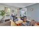 Inviting living room with comfortable seating, natural light, and stylish decor at 3918 Windgrove Xing, Suwanee, GA 30024
