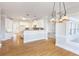 Bright kitchen featuring stainless appliances, granite countertops, hardwood floors and large windows that provide plenty of natural light at 6236 Benbrooke Nw Dr, Acworth, GA 30101