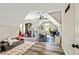 Upstairs bonus room offering vaulted ceilings, laminate floors, and a playful design at 105 Chantilly Ln, Fayetteville, GA 30215