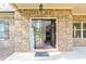 Welcoming front entrance with double doors and brick surround at 105 Chantilly Ln, Fayetteville, GA 30215