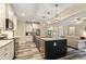 Spacious kitchen with stainless steel appliances, granite countertops, and a central island at 105 Chantilly Ln, Fayetteville, GA 30215