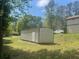 Spacious outdoor shed offering ample storage space on a well-maintained lot at 1500 Country Ct, Auburn, GA 30011