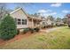 Side view of a cozy home featuring manicured bushes, offering a serene and welcoming atmosphere at 162 Brookhaven Way, Rockmart, GA 30153