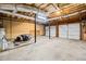 Large unfinished garage features two doors and ample space for parking and storage at 162 Brookhaven Way, Rockmart, GA 30153
