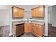 View of a kitchen with stainless steel dishwasher, sink, and neutral paint colors at 162 Brookhaven Way, Rockmart, GA 30153