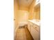 Bathroom features a vanity with sink, tile flooring and tub/shower combination at 2548 Gadsen Walk, Duluth, GA 30097