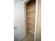 Linen closet with ceramic tile flooring and white wire shelves at 2548 Gadsen Walk, Duluth, GA 30097