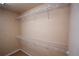 This walk-in closet features metal shelving for organized storage at 2548 Gadsen Walk, Duluth, GA 30097