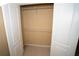 Open closet features shelving providing storage space at 2548 Gadsen Walk, Duluth, GA 30097