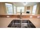 Stainless steel kitchen sink with modern faucet and lots of countertop space at 2548 Gadsen Walk, Duluth, GA 30097