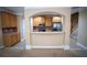Bright kitchen with a breakfast bar, stainless steel appliances, and seamless flow to other living areas at 2548 Gadsen Walk, Duluth, GA 30097